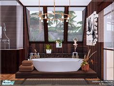 a bathroom with a large bathtub next to a window and pictures on the wall