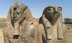 two large statues sitting next to each other