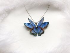 "🌸 Realistic design, Butterfly looks like a real one 🌸 Butterfly Wingspan (Width) is about 5.1 cm / 2\" 🌸 The price is only for the pendant (chain is included as a gift, - the chain is Rhodium plated of high quality, length 17.7\" / 45 cm) 🌸 Wings are made of silk with a beautiful 3D effect 🌸 Great gift for those who love Moths and Butterflies! Ready to ship! Feel free to write me if you have any questions! 😊" Blue Butterfly Necklace For Gifts, Blue Butterfly Necklace For Gift, Unique Blue Butterfly-shaped Jewelry, Unique Blue Butterfly Jewelry, Nickel-free Butterfly Necklace For Gift, Nickel Free Butterfly Necklace For Gifts, Blue Butterfly Jewelry With Butterfly Print, Handmade Blue Butterfly Necklace, Multicolor Butterfly Jewelry Gift