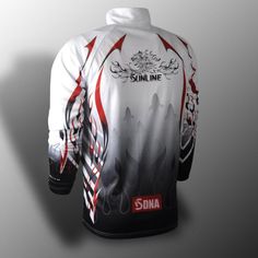 the back of a white jersey with red and black designs on it's sleeves