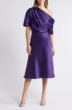 A graceful drape defines the chic silhouette of this toastworthy cocktail dress cut to a beloved midi length. 46 1/2" length (size 8) One-shoulder neck Elbow-length sleeves Lined 100% polyester Dry clean Imported Black Owned/Founded Pre-draped Knee-length Evening Midi Dress, Pre-draped Off-shoulder Midi Dress For Cocktail, Pre-draped Midi Dress With Draped Sleeves For Gala, Off-shoulder Ruched Midi Dress For Formal Occasions, Purple Midi Dress For Gala, Formal Pre-draped Knee-length Midi Dress, Elegant Off-shoulder Midi Dress For Dinner, Pre-draped One Shoulder Midi Dress For Dinner, Dressy Off-shoulder Midi Dress For Formal Occasions