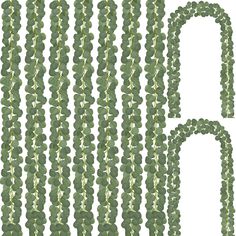 green beads are arranged in rows on a white background