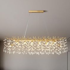 a modern chandelier hanging from the ceiling