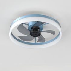 a ceiling fan that is on the ceiling