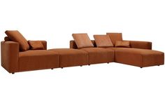 a brown sectional couch with pillows on it's back and side facing each other