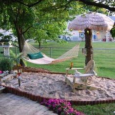 a hammock in the middle of a yard