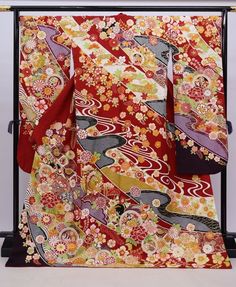 A classic red vintage silk Furisode Kimono with floral design. Brighten up you day wearing this kimono or by hanging it as a display to enjoy everyday. Item: Furisode Silk Kimono No. frn199 Size: US  L  /  Length 68.5 inch (174cm), Width 28 inch (72cm). Design :  Floral Condition: Used, Very Good. Please check the photos. Need a Obi Sash? Find it here: https://www.etsy.com/shop/KimonoFujiyamarock?ref=seller-platform-mcnav§ion_id=13757607 Shop the entire collection https://fujiyamarock.etsy.com Ships FREE by Express DHL.  5-10 day delivery from ship by date. Thanks so much for visiting! Vintage Floral Print Kimono For Wedding, Vintage Long Red Kimono, Vintage Red Long Kimono, Vintage Red Kimono For Wedding, Red Long Kimono For Wedding, Long Red Kimono For Wedding, Elegant Red Kimono For Wedding, Traditional Red Silk Kimono, Red Long Sleeve Kimono With Floral Print