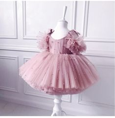 Pretty pretty party dress for your little princess! Great for Valentine's Day. birthdays, weddings, parties, events and photo shoots. Puff sleeve princess dress with bows at the shoulders, beautiful layers of pink tulle and tiny pearls all over the bodice and skirt. Available in 2 gorgeous shades of pink. Available in sizes 9M-5T. Good things take time. This gorgeous dress ships directly to you from our overseas warehouse, and will arrive in approximately 10-15 business days. Princess Dress Pink, Baby Baptism Dress, Pretty Party Dresses, Girls Birthday Party Dress, Baby Party Dress, First Communion Dress, Baptism Dress, Christening Dress