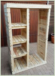 a wooden shelf sitting on top of a brick floor