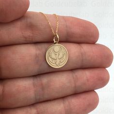 ● Material of pendant: Solid gold 14k ( REAL GOLD ) ● Metal Stamp: 14k ● The pendant is available in 3 sizes: 14,0 mm / 0,55 inches ( Diameter ) 16,5 mm / 0,65 inches ( Diameter ) 19,1 mm / 0,75 inches ( Diameter ) ( In the photos the size of the pendant is 14mm / 0.55 inches Diameter ) ● Material of chain: Solid gold 14k ( REAL GOLD ) ● Chain Options: **Chain No.1  :  thickness 0,7mm  **Chain No.2 :  thickness 1,3mm ● Chain Length: - 40 cm / 15,75 inches ( Length ) - 45 cm / 17,72 inches ( Leng Spiritual 14k Gold Jewelry Stamped 14k, 14k Gold Symbolic Charm Necklace With Round Pendant, Spiritual 14k Gold Charm Necklace For Anniversary, Symbolic 14k Gold Engraved Charm Necklaces, Symbolic Engraved 14k Gold Charm Necklaces, Symbolic 14k Gold Jewelry For Commemoration, 14k Gold Coin Pendant Charm Necklace For Anniversary, 14k Gold Charm Necklace With Coin Pendant For Anniversary, Symbolic 14k Gold Necklaces Stamped 14k