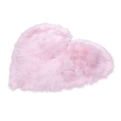 a pair of pink fuzzy slippers on top of each other