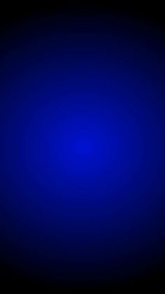 a dark blue background with some light on it