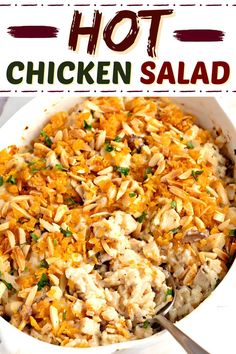 this chicken salad is loaded with carrots and parmesan cheese in a white casserole dish