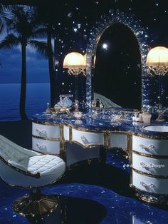 the vanity is decorated in white and gold