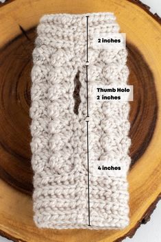 the crochet pattern is shown on top of a piece of wood with measurements