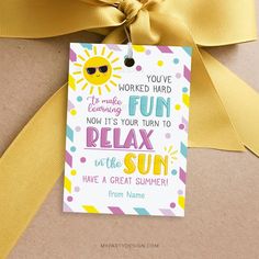 a gift tag that says, you've worked hard learning how to relax in the sun have a great summer