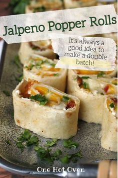 some food is on a plate with chopsticks next to it and the words jalapeno popper rolls