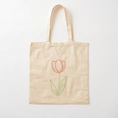 a tote bag with a flower drawn on it