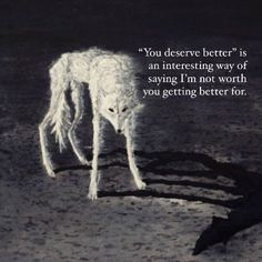 a white dog standing on top of a dirt field next to a black bird and a quote