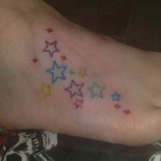 a foot with colorful stars on it