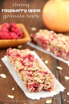 homemade chewy raspberry apple granola bars with oats on the side