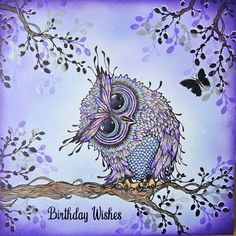 an owl is sitting on a branch with purple leaves and butterflies in the background that says, birthday wishes