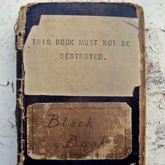 this book must not be destroyed, black book is written on the front and back