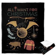 a black blanket with an image of christmas items on it and the words all i want for