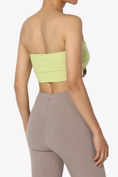 Embrace a playful yet chic vibe with our Colorblock Bow Knot Tie Front Bandeau.This eye-catching Strapless Crop Top features a bold colorblock design, accented with a charming bow knot for a touch of femininity.The ribbed texture adds a modern twist, making it perfect for pairing with over a tank top and high-rise jeans or flowy maxi skirts.Ideal for sunny days out or stylish evenings, it's a versatile addition to your wardrobe. Add this must-have top to your collection and turn heads with every stepColorblock design bandeau, ideal for summer parties or beach outgoingBow knot tie front detail, Double-lined front, No wireRibbed texture for a trendy look, perfect for high waisted jeans or skirtsStrapless style for a chic and stylish outfitModel size : 5'3" height, 33" bust, 24" waist, 34" hi Green Solid Color Crop Top, Trendy Green Strapless Tube Top, Green Bandeau Top For Day Out, Trendy Green Bandeau Tube Top, Chic Multicolor Bandeau Tube Top, Trendy Green Strapless Crop Top, Chic Green Bandeau Crop Top, Green Cotton Tube Top, Trendy Green Strapless Top