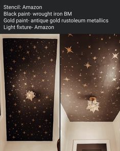 the ceiling is decorated with gold stars and white paint on black wallpaper, along with an open door