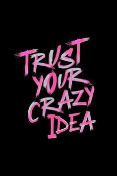 the words trust your crazy idea are painted in pink and black on a black background