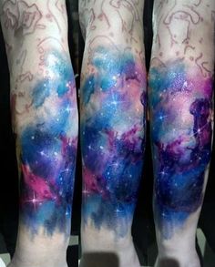 the legs are covered with colorful tattoos on them, and there is no image to describe