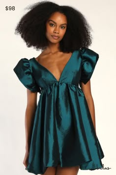 The Lulus Dramatic Dreams Dark Teal Taffeta Ruffled Babydoll Dress is the only reason we need to get dressed up! Shiny, woven taffeta shapes this stunning dress with a darted bodice, plunging V-neckline, and a low scoop back, framed by dramatic ruffled sleeves (with no-slip strips). The babydoll silhouette features an empire waist that tops an A-line mini skirt that ends at bubble hem. Hidden back zipper/clasp. Fit: This garment fits true to size. Length: Above mid-thigh. Size medium measures 34 Empire Waist Hoco Dress, Black Ruffle Hoco Dress, Semi Formal Babydoll Dress, Recruitment Dresses Sorority, Mid Length Hoco Dresses, Teal Homecoming Dress, Sadie’s Dance Dresses, Hoco Dress Loose, Fall Wedding Guest Dress November