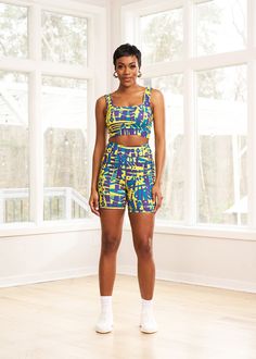 Style #: A2017NTSThe Adamma African Print Sports Bra makes for a stylish take on traditional activewear. The bold printed style can be worn to the gym with our Kimba biker shorts or with a pair of jeans for a night out with friends. Shop all our activewear here. Squared neckline Elastic band with D'IYANU logo on back Medium support Wicking properties 87% nylon/13% spandex​ Designed in the USA, Imported Cold wash. Tumble dry low. Model size: Small | Height 5'11" | Bust 34" | Waist 27" | Hips 38" Summer Compression Athletic Shorts, Trendy Spring Activewear With Graphic Print, Summer Compression Sportswear Athletic Shorts, Summer Sportswear Activewear In Short Length, Summer Sportswear Activewear Shorts, Casual Biker Shorts For Summer Training, Summer Workout Sportswear Athletic Shorts, Multicolor Activewear With Built-in Shorts, Summer Athleisure Activewear Shorts