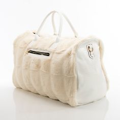 This spacious carrying bag features a fur and leather exterior and designer stylings that make it an impact making addition to any outfit and perfect for either casual or business outings. Product Dimensions (Inches): 21 x 13 x 11 Faux-Leather and Fur Exterior Polyester Lining Luxury Faux Fur Shoulder Bag, Luxury Faux Fur Shoulder Bag With Fur Lining, Trendy Faux Fur Shoulder Bag With Faux Fur Lining, Luxury Rectangular Faux Fur Shoulder Bag, Luxury Faux Fur Rectangular Shoulder Bag, Luxury Sheepskin Bags With Faux Fur Lining, Luxury Travel Bags For Winter, Luxury Winter Travel Shoulder Bag, Rectangular Faux Fur Winter Bag