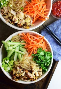 two bowls filled with different types of food