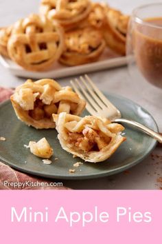 mini apple pies on a plate with a fork and cup of coffee in the background