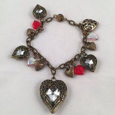 Antique Heart Bracelet | Etsy Red Heart-shaped Metal Bracelets, Red Heart-shaped Metal Bracelet, Valentine's Day Metal Heart Bead Bracelet, Valentine's Day Metal Charm Bracelet With Heart Beads, Metal Heart-shaped Charm Bracelet With Heart Beads, Heart-shaped Bracelets With Lobster Clasp For Valentine's Day, Vintage Heart-shaped Charm Bracelet For Valentine's Day, Red Heart-shaped Charm Bracelet, Red Heart Charm Bracelet