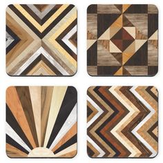 four coasters with different designs on them