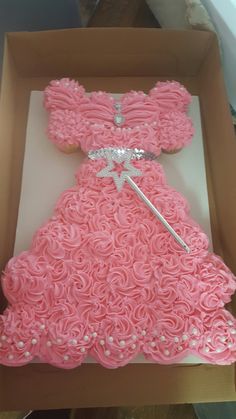 a cake in the shape of a princess dress