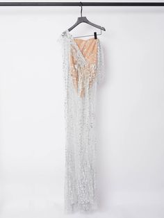 No dress is more party-ready than a sparkly Bailee Split Sequin Maxi Dress. Completed with an off-the-shoulder neckline, a form fitted silhouette with ruched details and a hidden zip closure at back, and a maxi dress cut, this stunning dress in our boutique takes a trendy modern look on classic party dresses. Dress up this glamorous and sophisticated outfit with a simple pair of shoes and gold tone hoop earrings.  
    Material: 100% Polyester    Invisible zipper opening at the back   Stretch Shapewear Tops, Classic Party, Maxi Dress Sale, Sequin Maxi Dress, Sequin Maxi, Jumpsuits And Romper, Feather Dress, Sparkly Dress, Maxi Dress Green