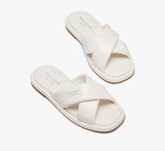 Find your paradise with our Rio slides. Made from faux leather these sandals take you from the pool to happy hour with ease… | Kate Spade Rio Slide Sandals, Cream - 8 White Open Toe Sandals For Pool, Spring Pool Sandals With Synthetic Material, Spring Pool Sandals Slip-on, Spring Slip-on Pool Sandals, Spring Pool-ready Slip-on Sandals, Spring Season Slip-on Pool Sandals, Spring Slip-on Sandals For Pool, Kate Spade Flat Sandals For Beach, Kate Spade Synthetic Sandals For The Beach