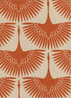 an orange and white fabric with large leaves on it