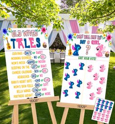 two wooden eases with signs and stickers on them in front of a tent