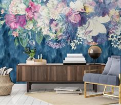 a living room with floral wallpaper on the walls