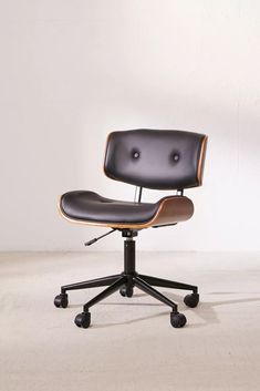 an office chair with wheels on the back and seat upholstered in black leather