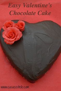 a chocolate heart shaped cake with roses on top and the words easy valentine's chocolate cake