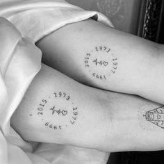 two people with tattoos on their legs and the words love are written in cursive writing