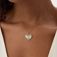 Made to Order Gold Kt: 14K (also available in 18K) Available Gold Colors: Rose Gold, Yellow Gold, White Gold Length and Width of Heart Disc: 18 x 18MM Round Diamond: 1 Pc 2.9MM Diamond Carat Weight: 0.10 ctw Luxury Diamond Cut Heart Pendant Necklace, Luxury White Gold Heart-shaped Jewelry, Luxury Heart-shaped White Gold Jewelry, Luxury Heart Shaped White Gold Jewelry, Luxury White Gold Heart Jewelry, Luxury White Gold Heart Necklace With Diamond Cut, Heart Shaped White Gold Jewelry Stamped 14k, Luxury Jewelry With Heart Cut Heart Charm, Luxury Heart Cut Jewelry With Heart Charm