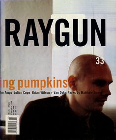 the front cover of raygun magazine showing a man with bald hair and no head